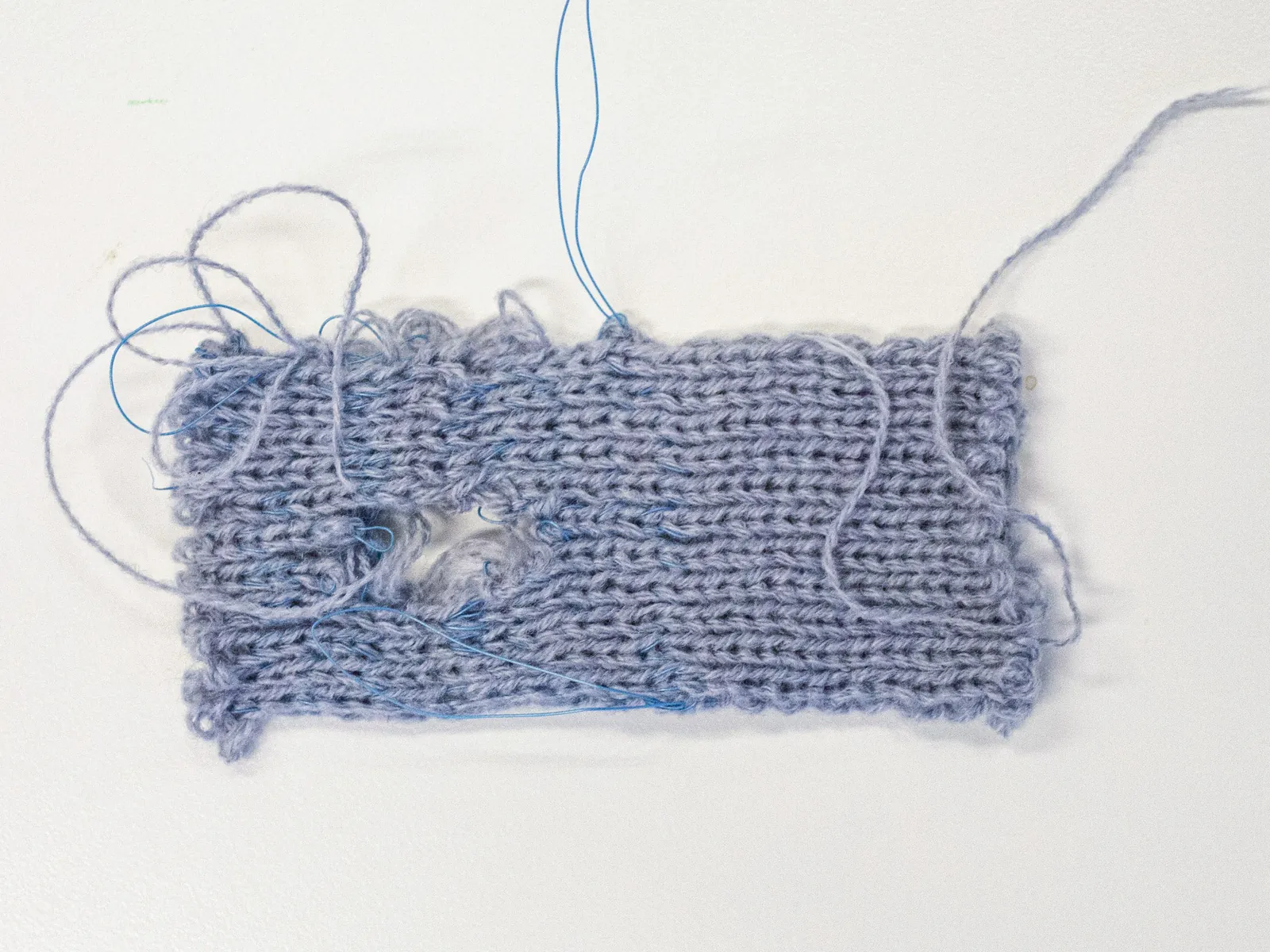 Stockinette–wire composite